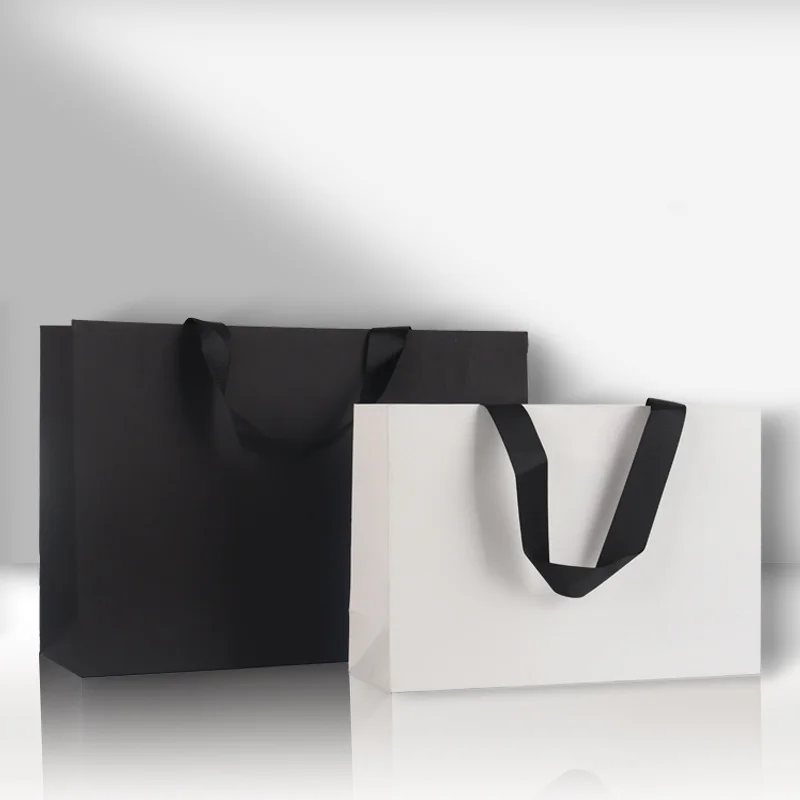 Custom Paper Gift Bags – Durable, eco-friendly paper bags with printed logos, perfect for packaging gifts, retail, parties, and events in various sizes and styles for personalized branding. - 图片 2