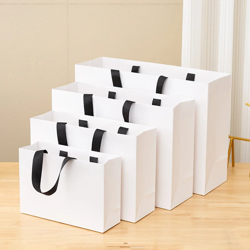 Custom Paper Gift Bags – Durable, eco-friendly paper bags with printed logos, perfect for packaging gifts, retail, parties, and events in various sizes and styles for personalized branding. - 图片 4
