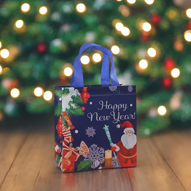 2Pcs Dark Blue Christmas Gift Bags | Cartoon Santa Elk Printed Non-Woven Handbags | Foldable High-Capacity Storage Bags for Holiday Party Gift Packaging 1