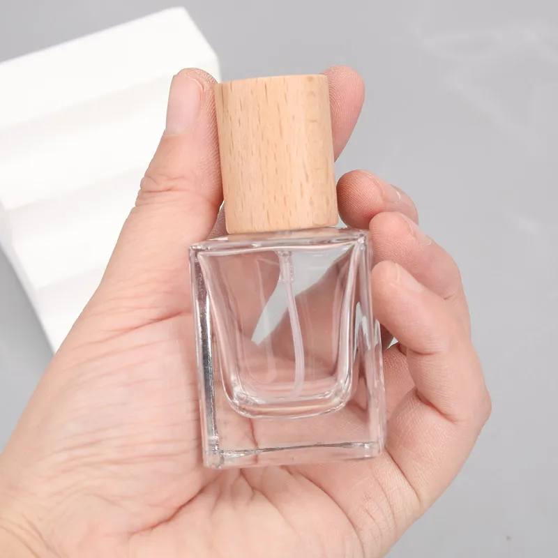 30ml & 50ml Refillable Flat Square Glass Perfume Bottles – Portable Travel Cosmetic Spray Containers with Replacement Wooden Caps, Empty Reusable Fragrance and Essential Oil Storage
