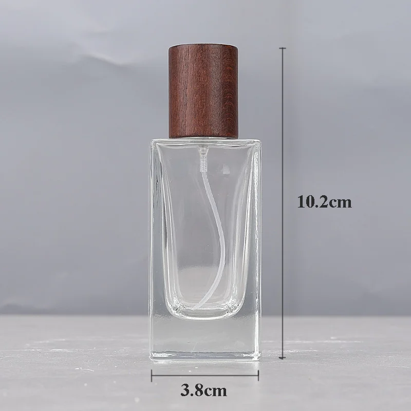 30ml & 50ml Refillable Flat Square Glass Perfume Bottles – Portable Travel Cosmetic Spray Containers with Replacement Wooden Caps, Empty Reusable Fragrance and Essential Oil Storage
