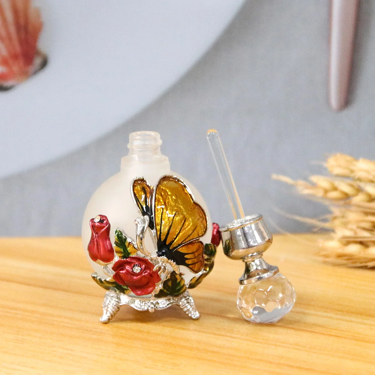 25ml Decorative Butterfly Rose Bottle with Zinc Alloy Metal Detailing and Glass Interior – Elegant Empty Container with Stainless Steel Applicator Stick for Essential Oils, Attar, Serums and Gift Packaging 1