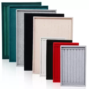 Velvet Jewelry Display Trays for Wholesale: Modular velvet tray inserts for rings, necklaces, and earrings, ideal for retail counter display.